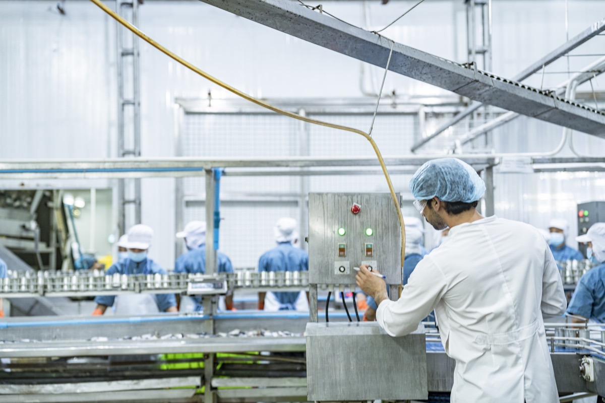 Close-up of the stainless steel production equipment.